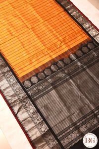 Kuttu Gadwal Pure silk handloom saree with silver zari - mustard yellow with black