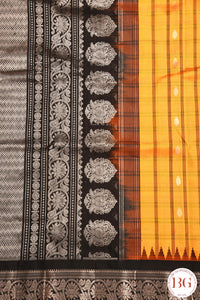 Kuttu Gadwal Pure silk handloom saree with silver zari - mustard yellow with black