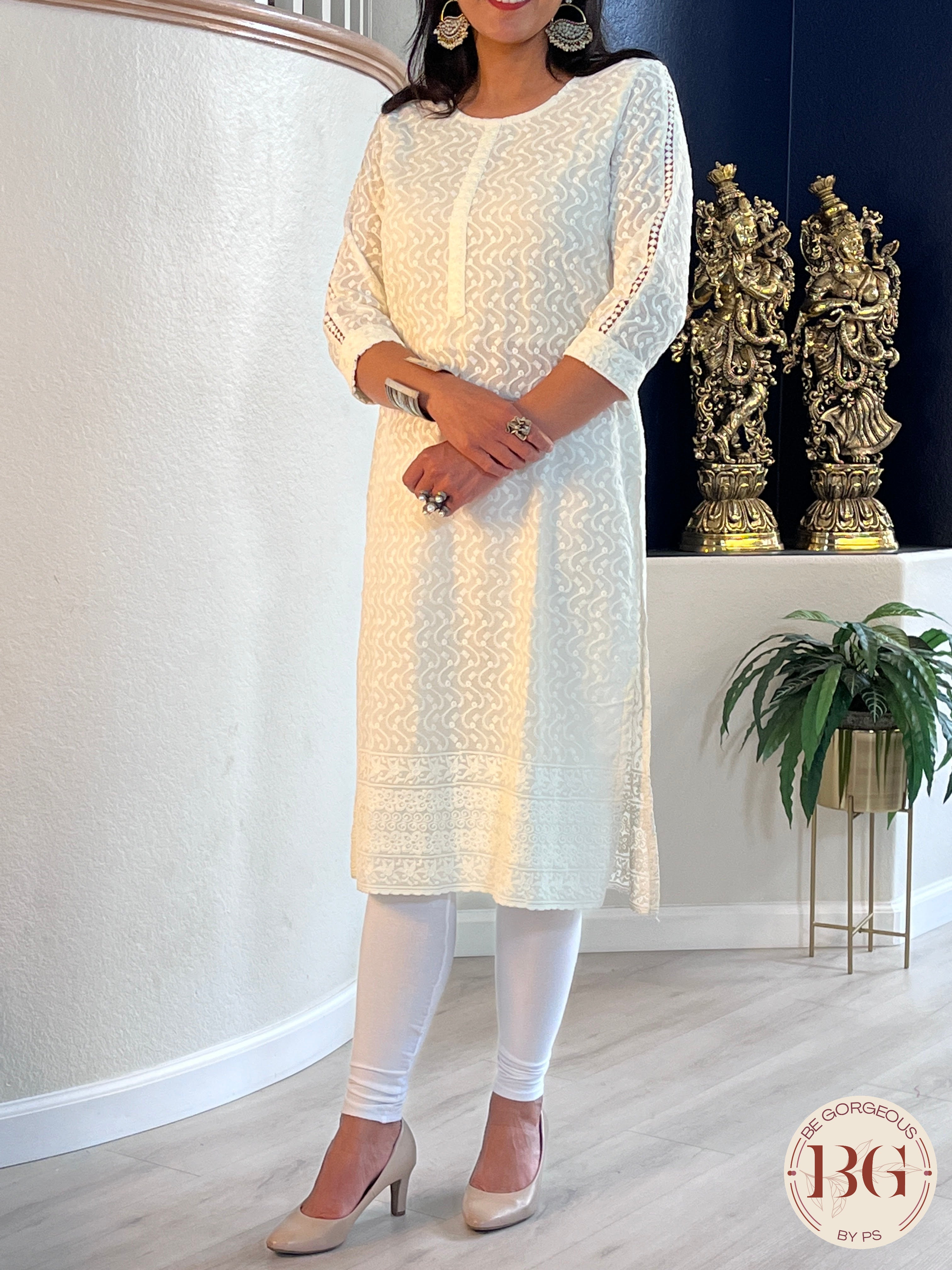 Off white color kurti with threadwork all over