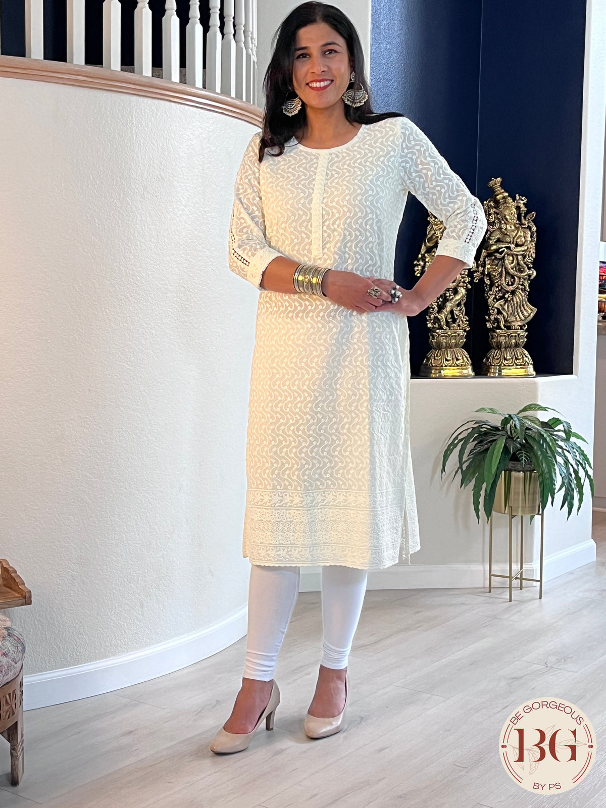 Off white color kurti with threadwork all over