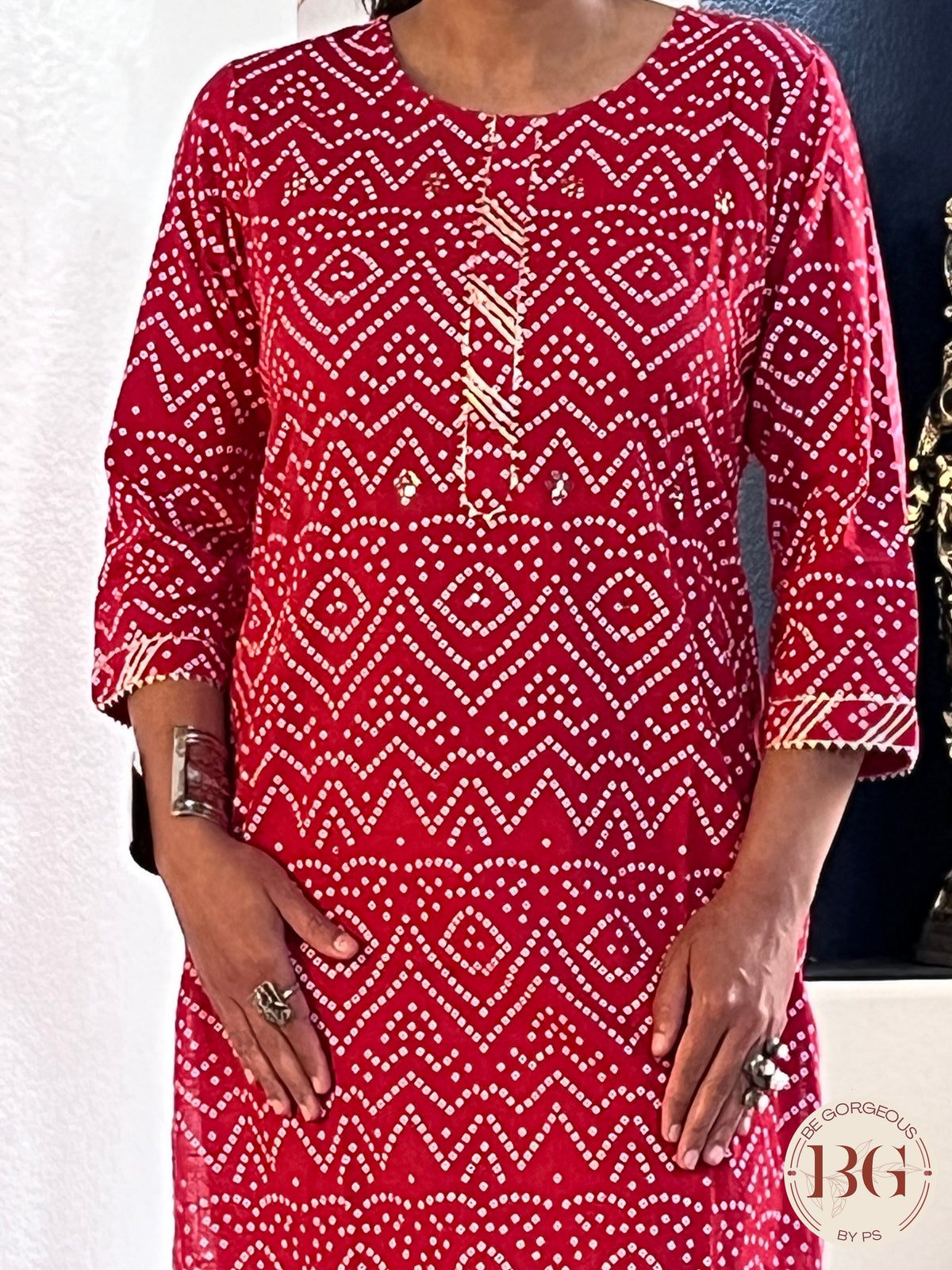Kurti with bandhani print in red color and mirror detailing