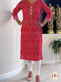 Kurti with bandhani print in red color and mirror detailing