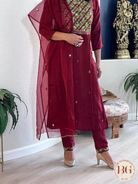 Party wear 3-piece suit in muslin silk fabric with organza dupatta and embroidery