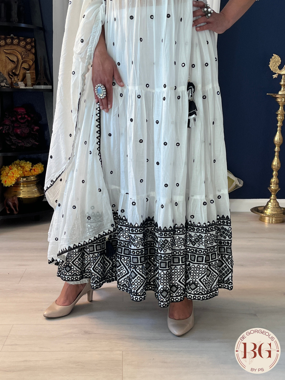 2-piece anarkali set with its intricate foil mirror work on soft mul cotton