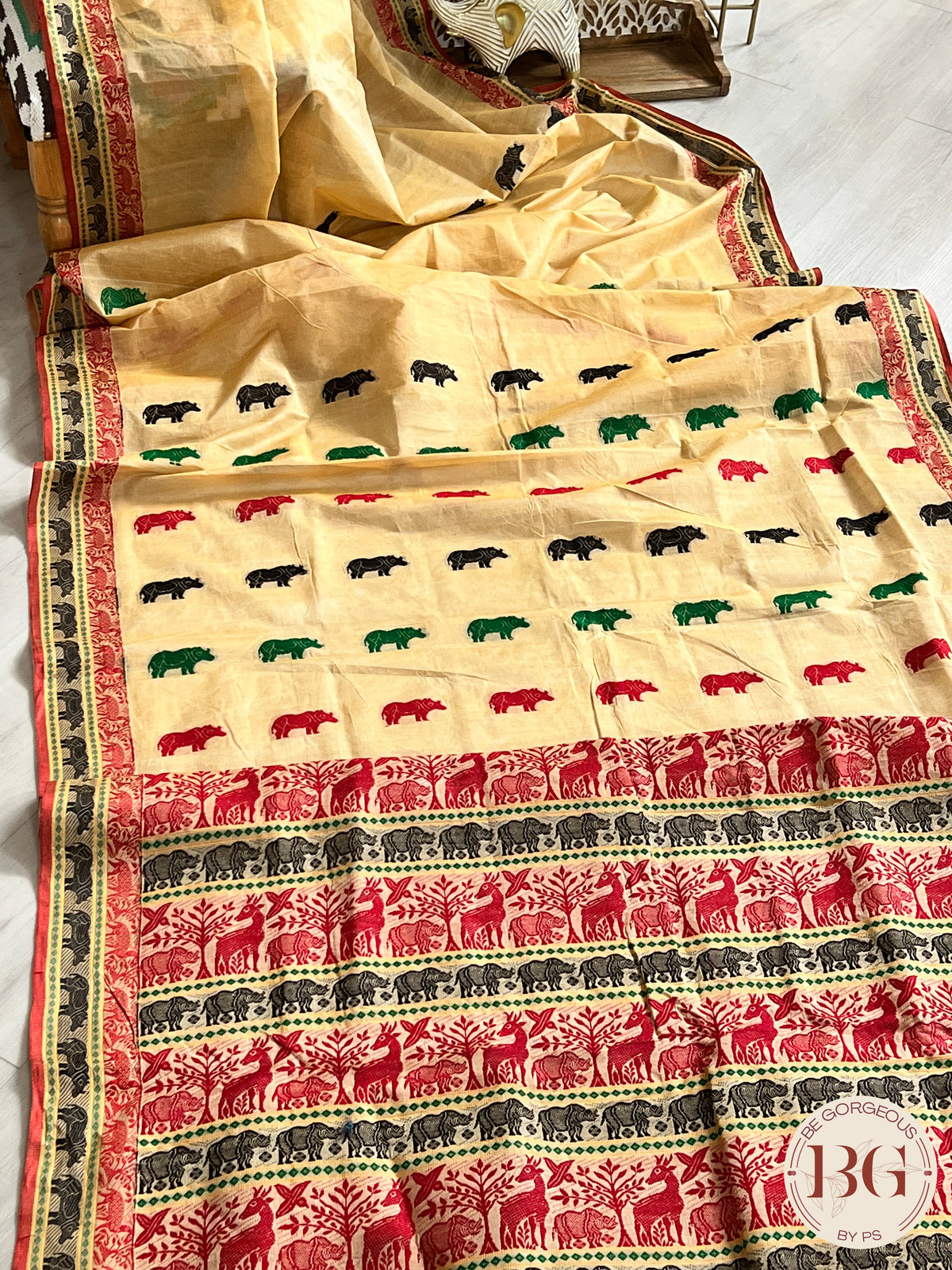 Kaziranga Assam Cotton Blend Saree in CREAM RED color with rhino motifs