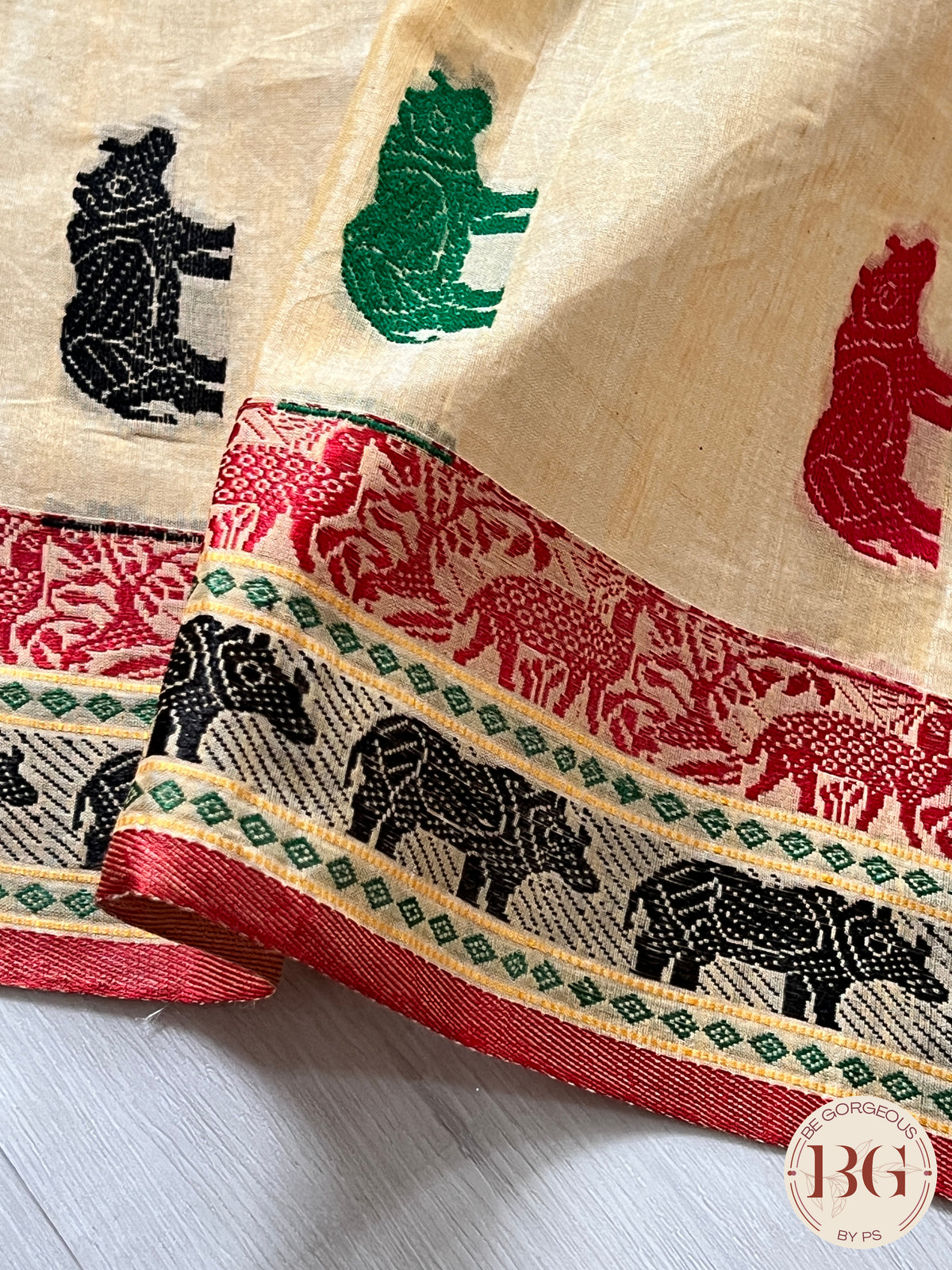 Kaziranga Assam Cotton Blend Saree in CREAM RED color with rhino motifs
