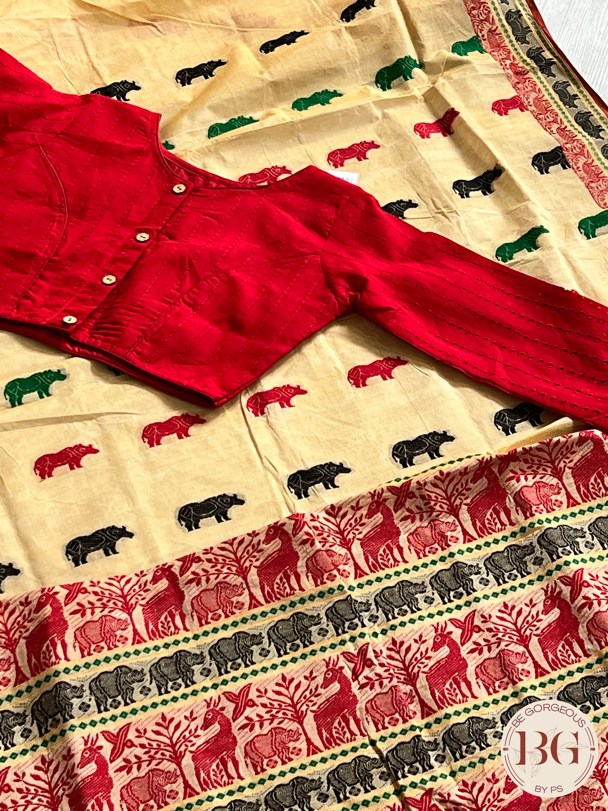 Kaziranga Assam Cotton Blend Saree in CREAM RED color with rhino motifs