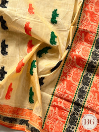 Kaziranga Assam Cotton Blend Saree in CREAM ORANGE color with rhino motifs