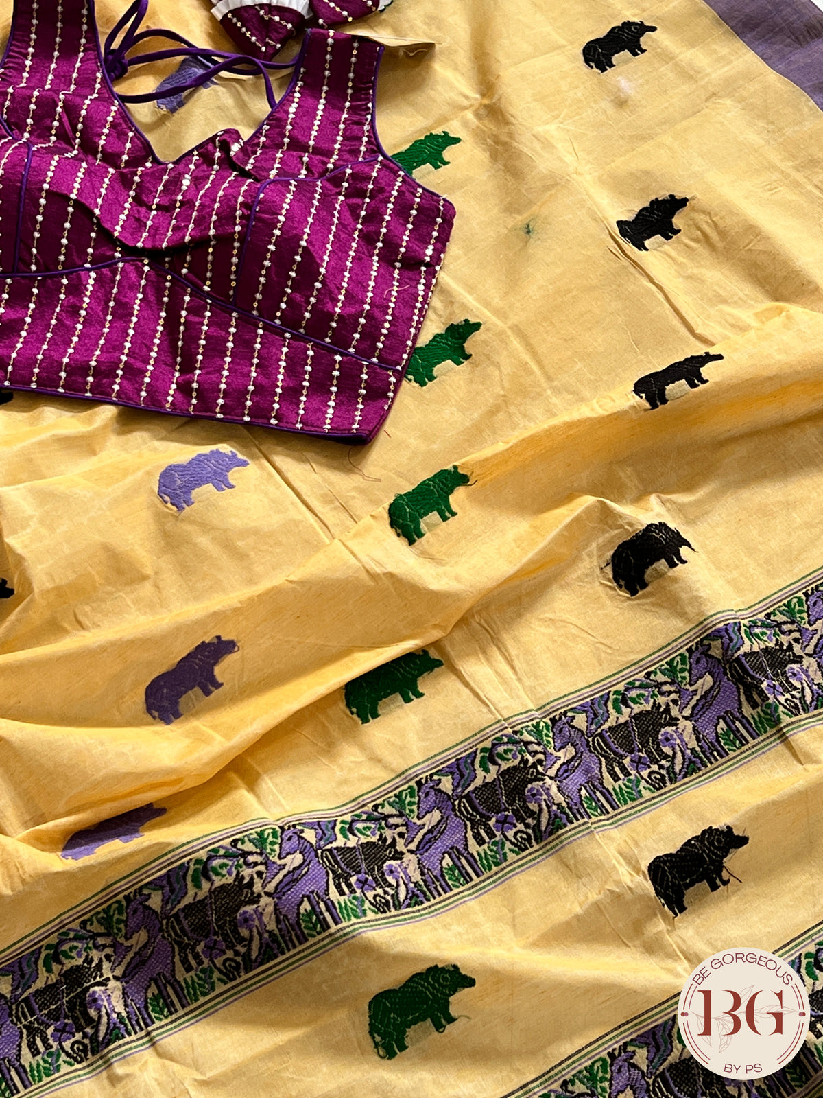 Kaziranga Assam Cotton Blend Saree in CREAM PURPLE color with rhino motifs