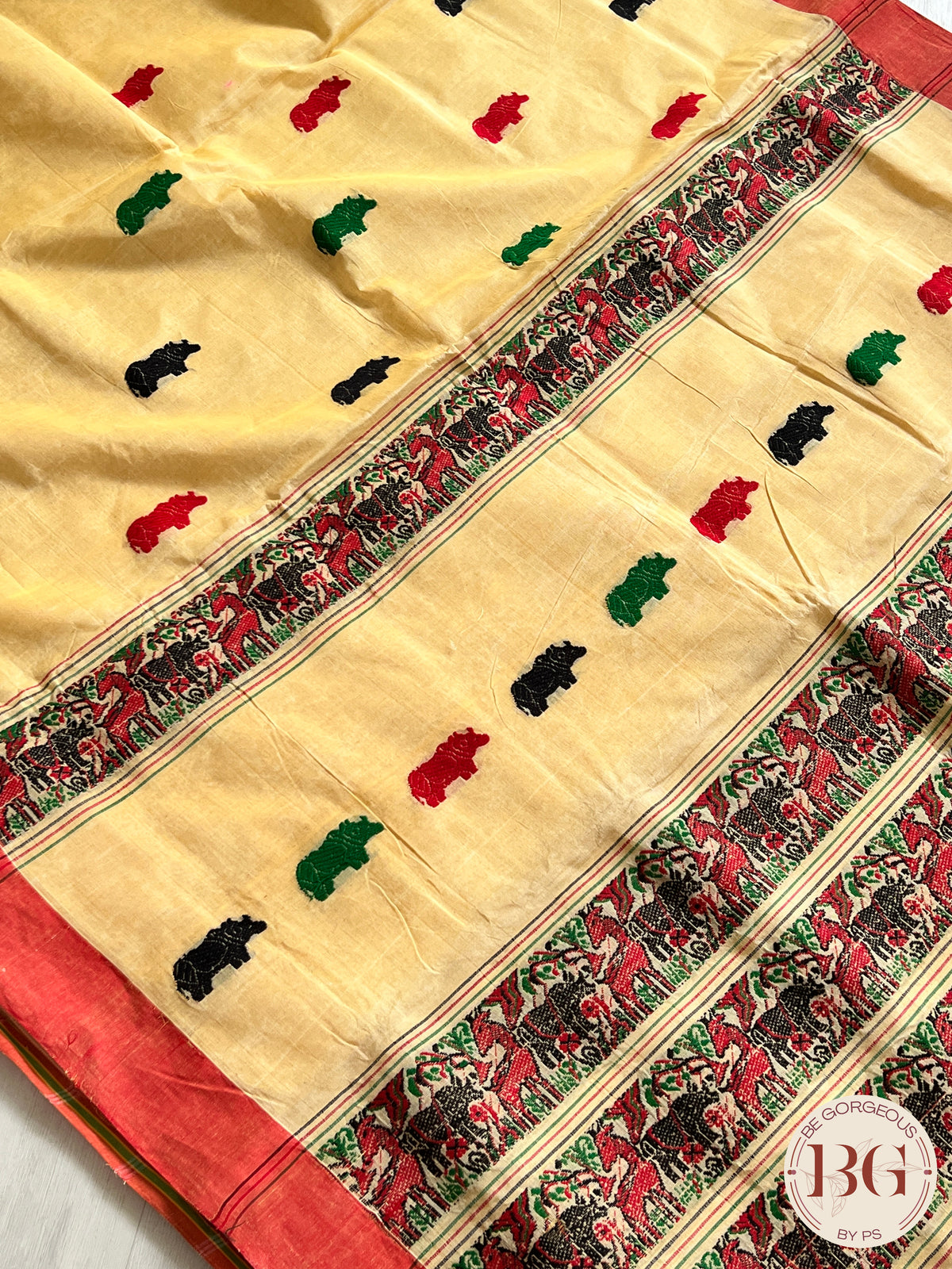 Kaziranga Assam Cotton Blend Saree in CREAM RED color with rhino motifs