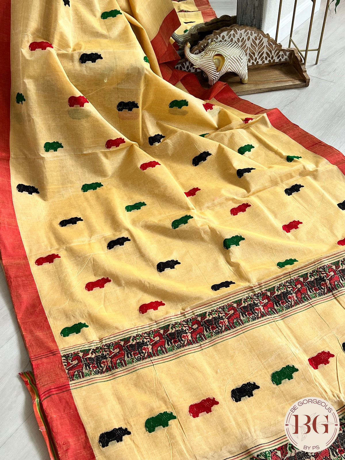 Kaziranga Assam Cotton Blend Saree in CREAM RED color with rhino motifs