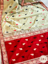 Kaziranga Assam Cotton Blend Saree in red and pista green color with rhino motifs