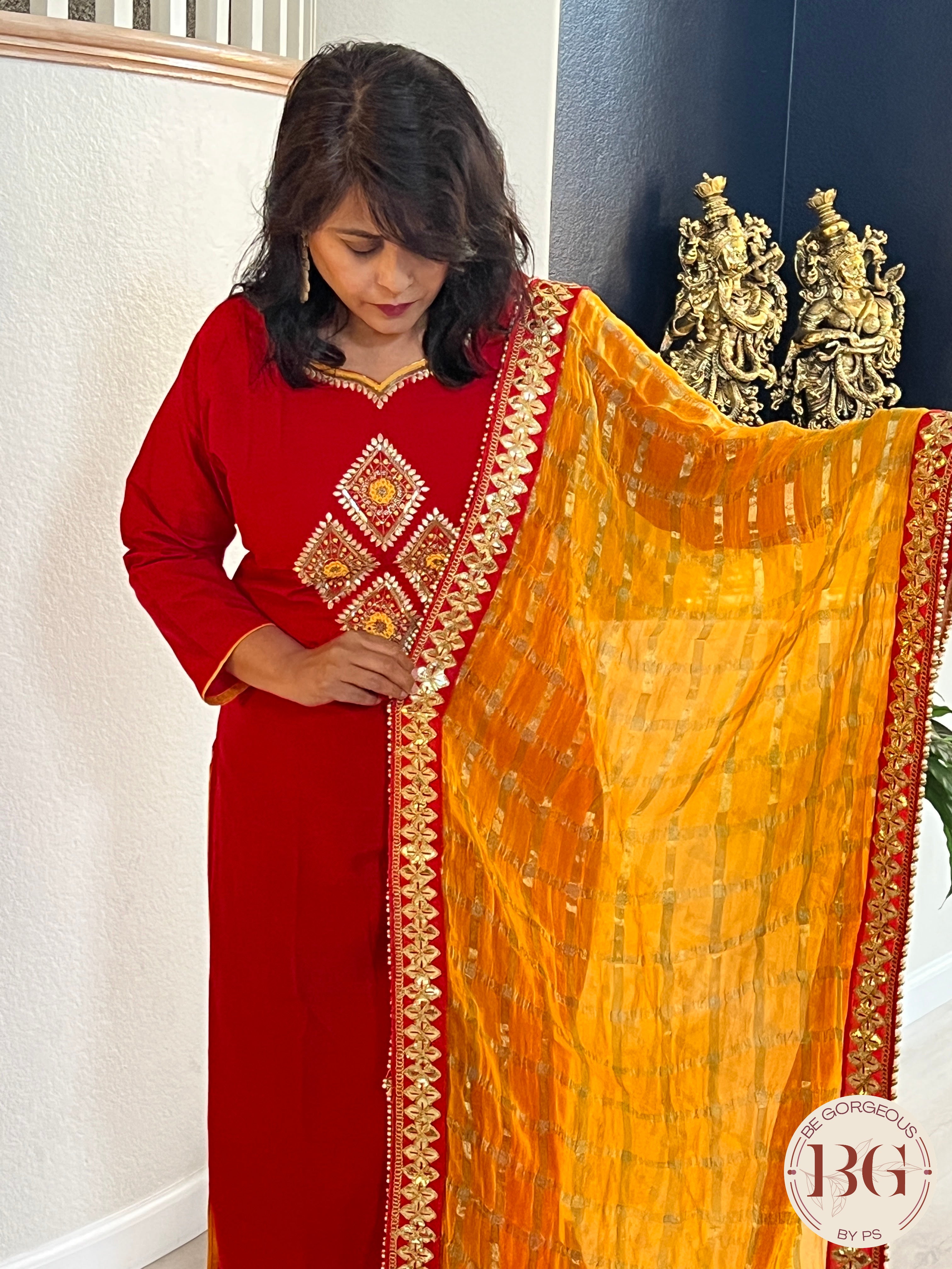 Party wear 3 piece suit in gorgeous red and yellow color combination. Muslin silk cloth.