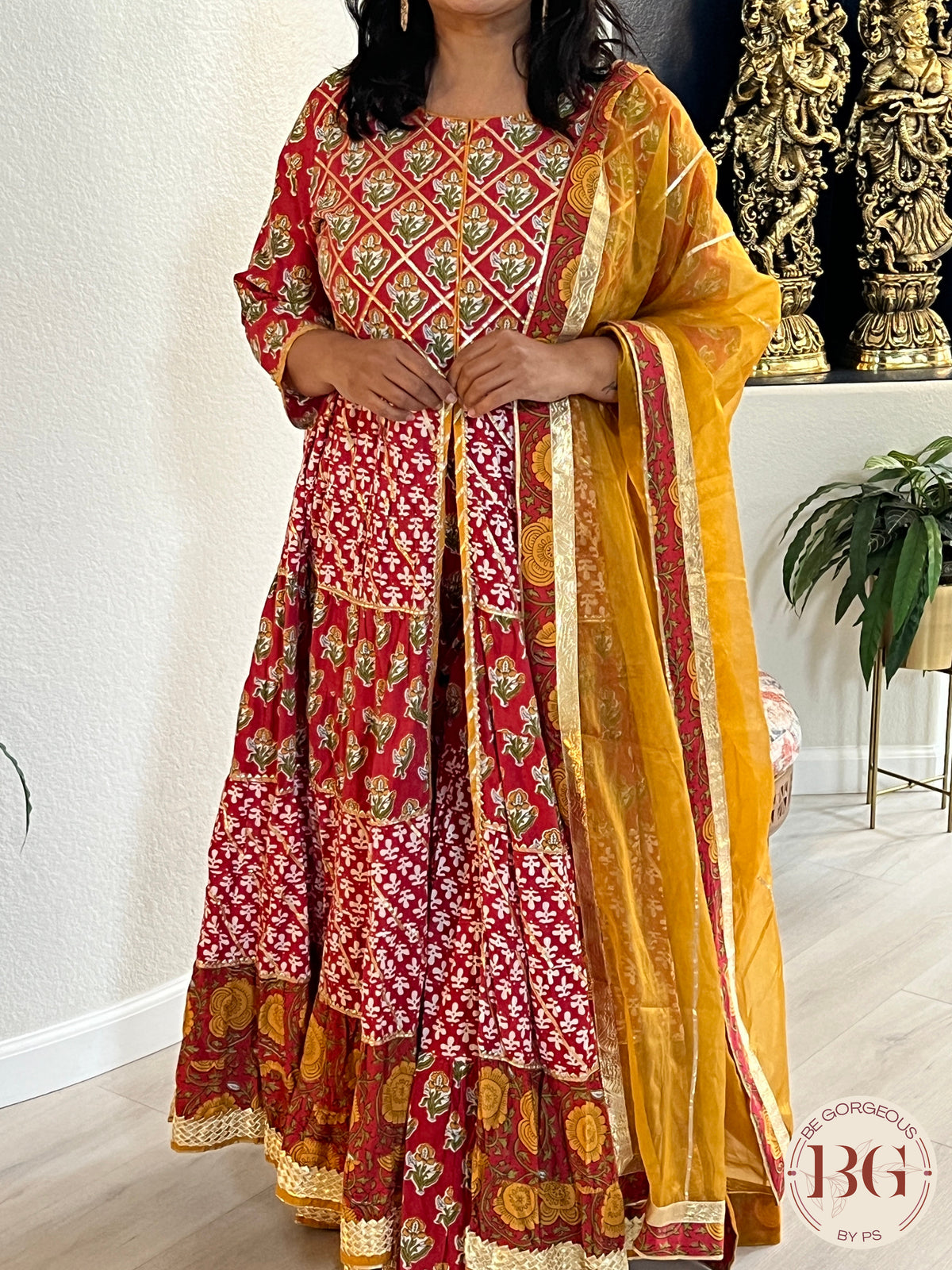 Garara set with organza dupatta in gorgeous red and and yellow combination.