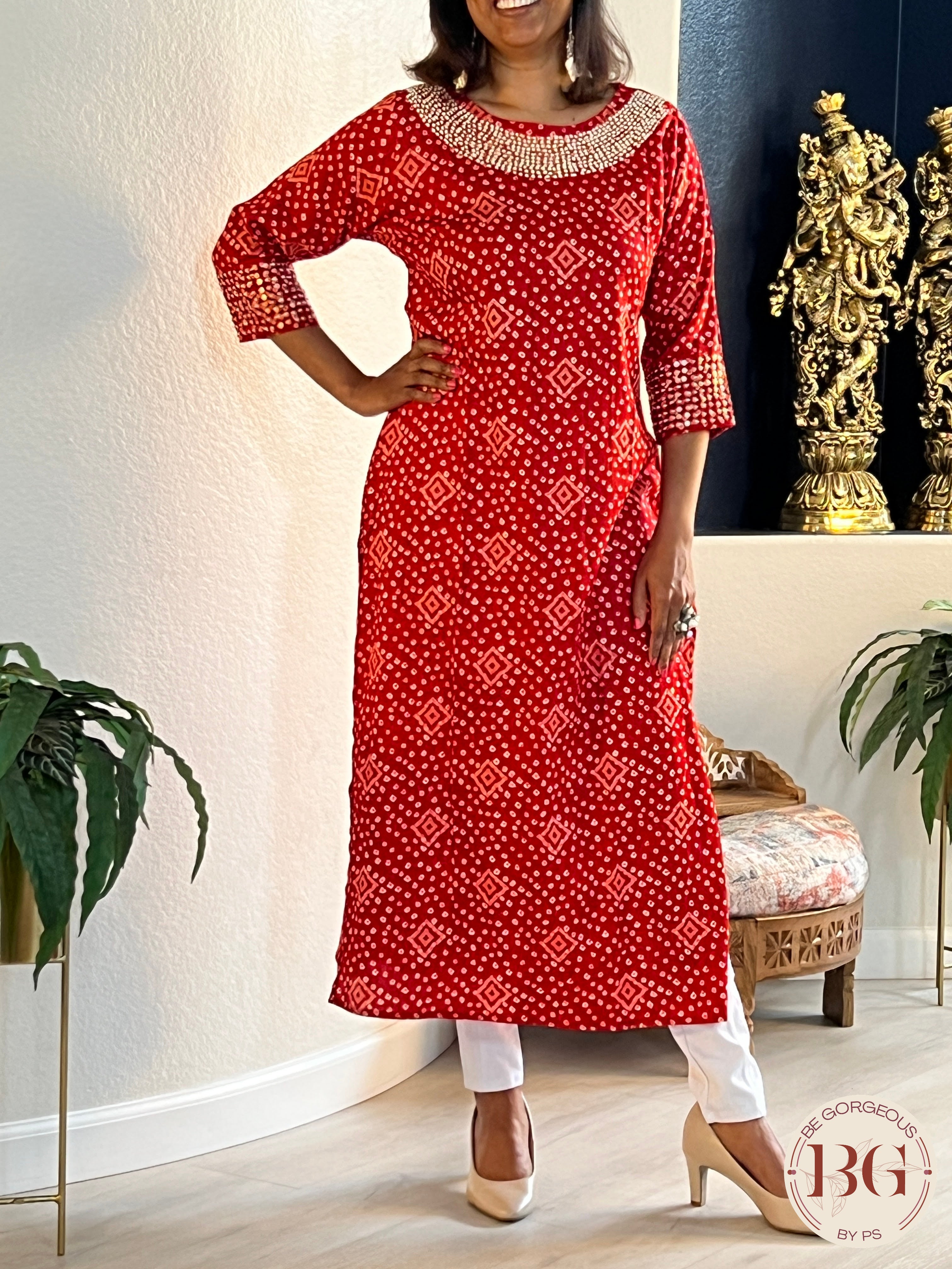 Rayon kurti in gorgeous red color with bandhani print and work on neck