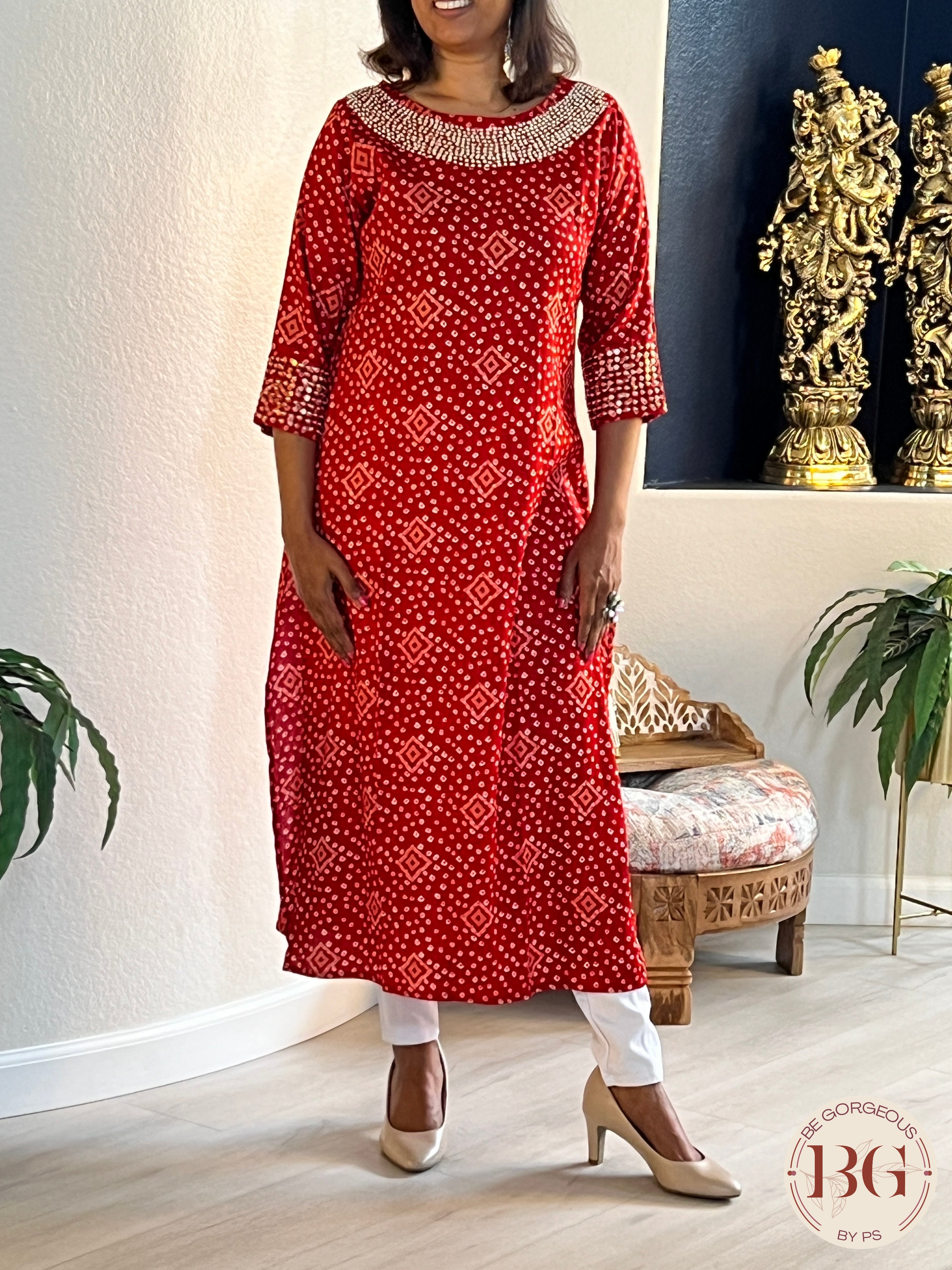 Rayon kurti in gorgeous red color with bandhani print and work on neck