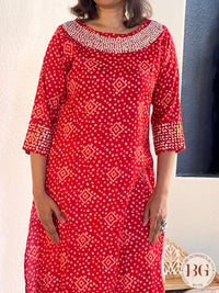 Rayon kurti in gorgeous red color with bandhani print and work on neck