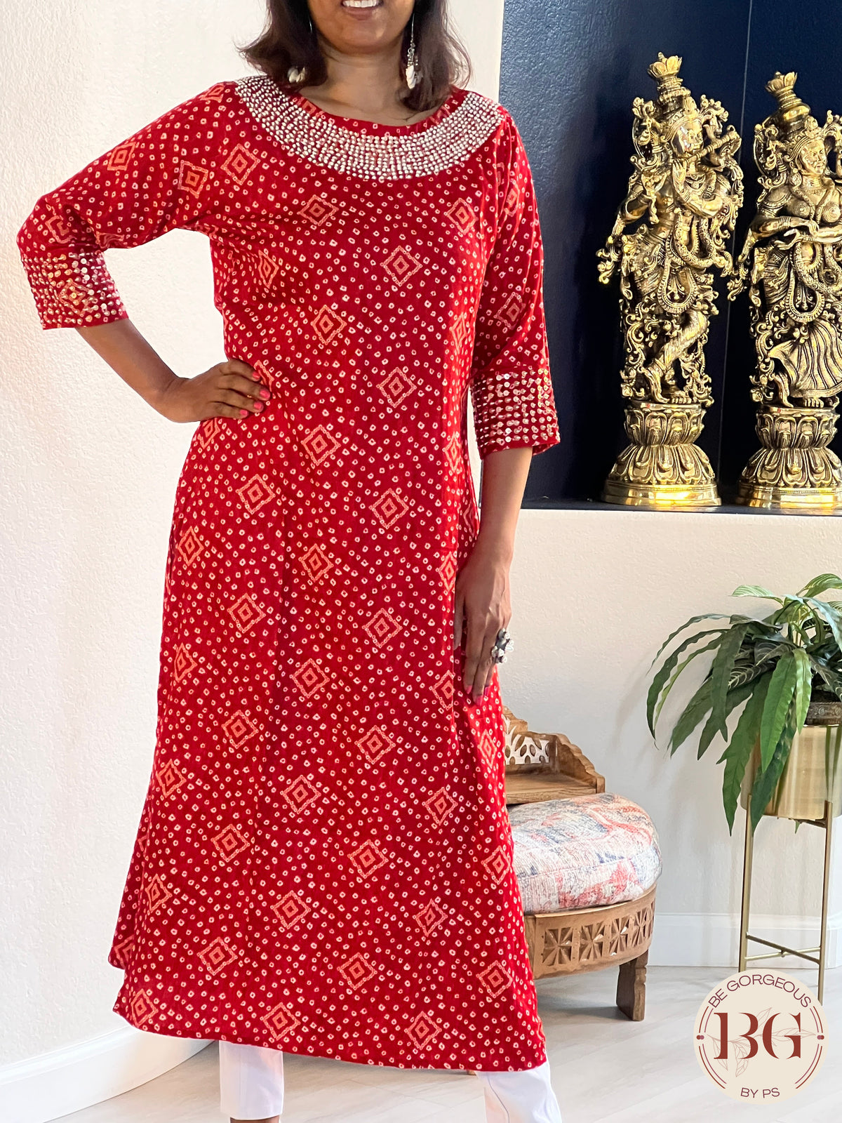 Rayon kurti in gorgeous red color with bandhani print and work on neck