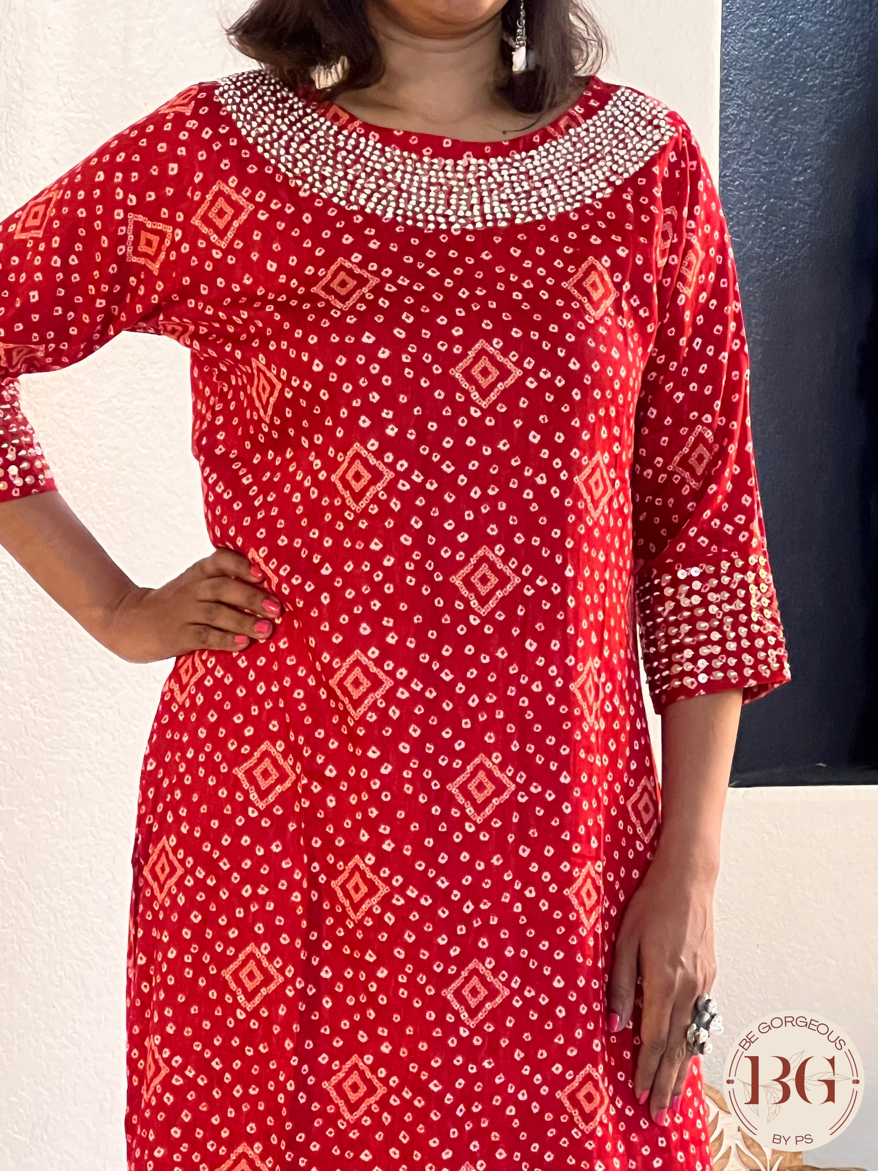 Rayon kurti in gorgeous red color with bandhani print and work on neck