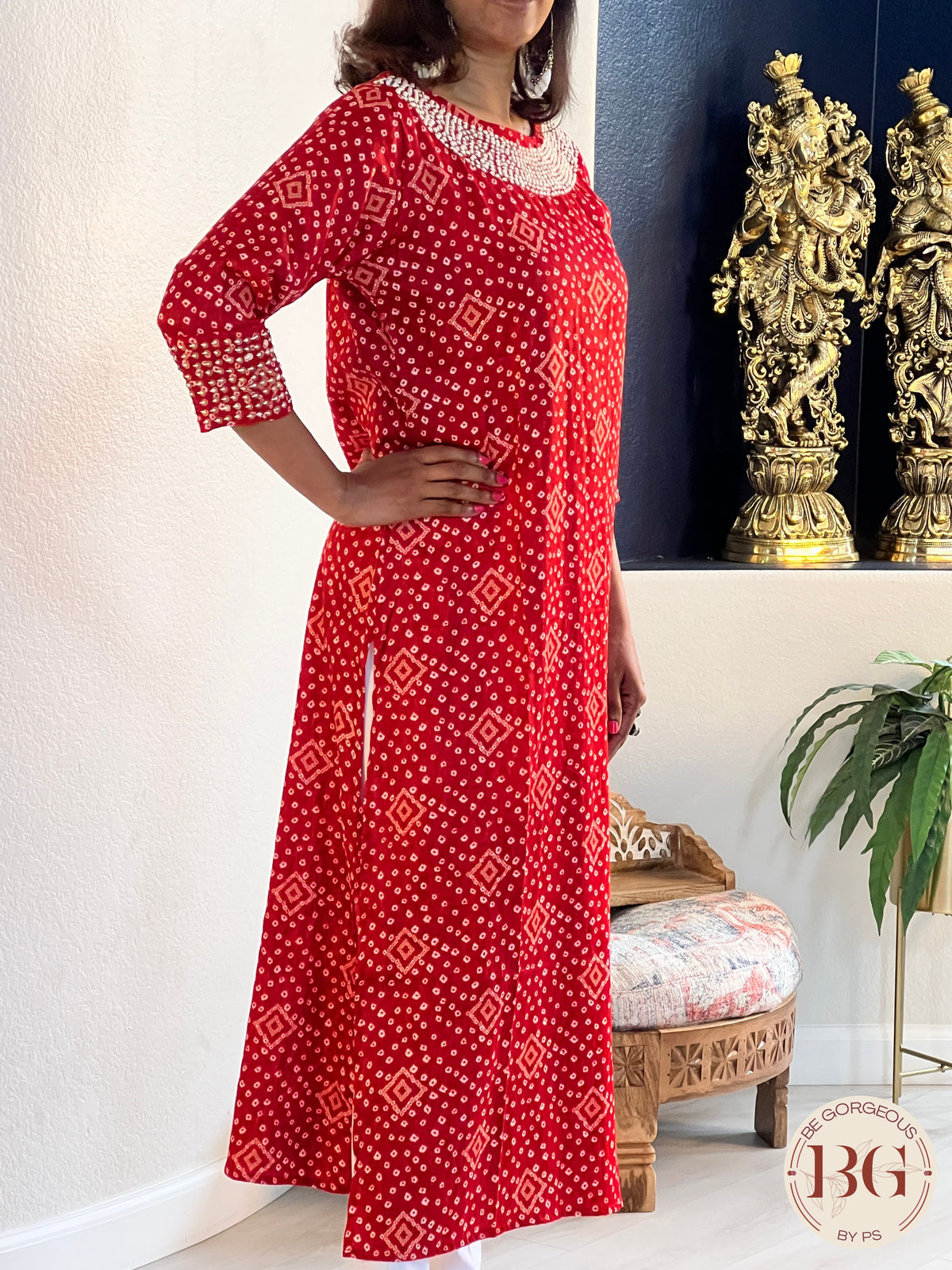 Rayon kurti in gorgeous red color with bandhani print and work on neck