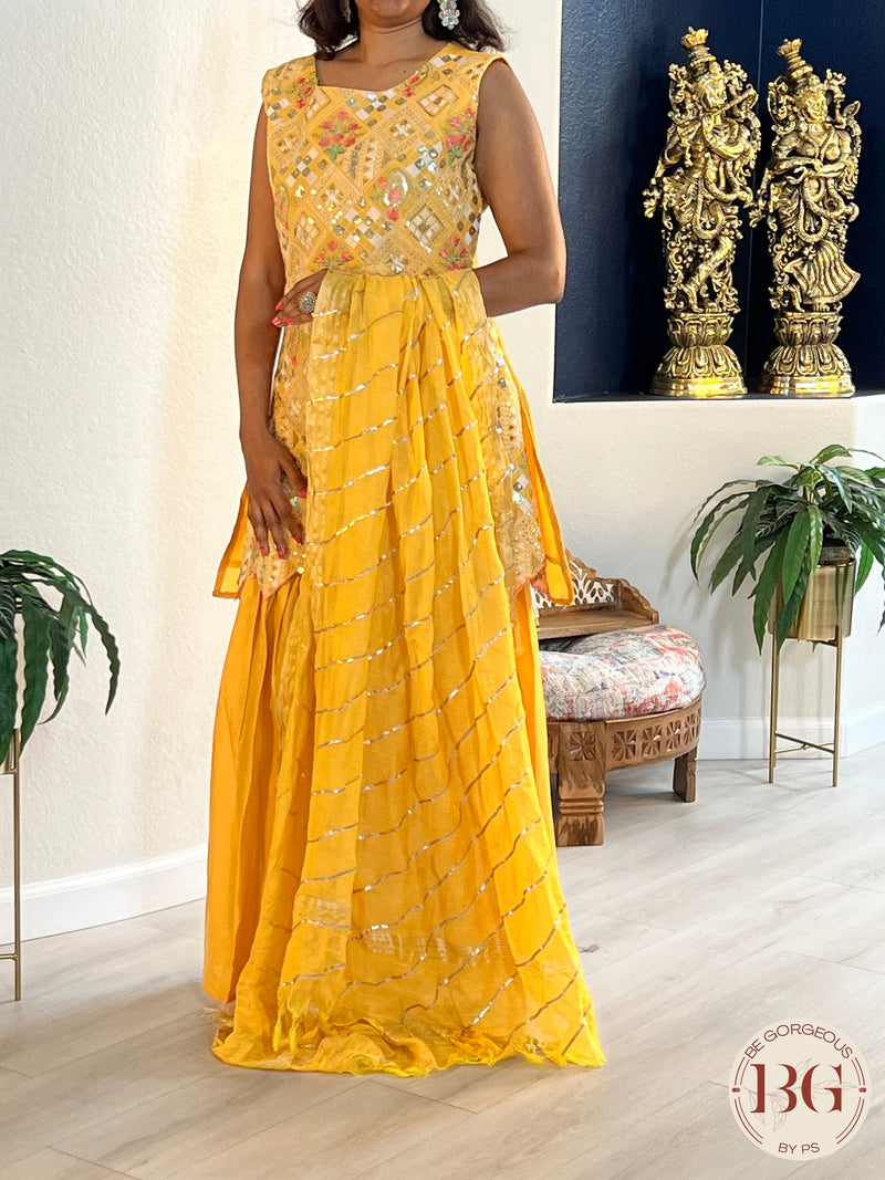 Garara set in gorgeous yellow color with gota and thread work