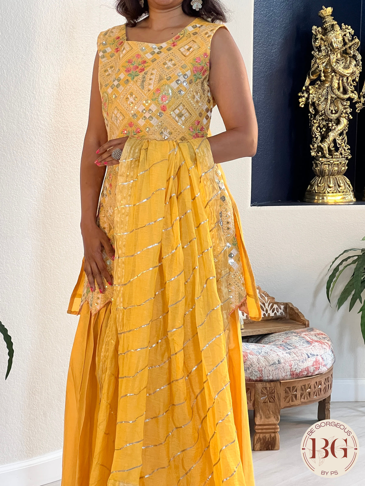 Garara set in gorgeous yellow color with gota and thread work