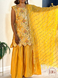 Garara set in gorgeous yellow color with gota and thread work