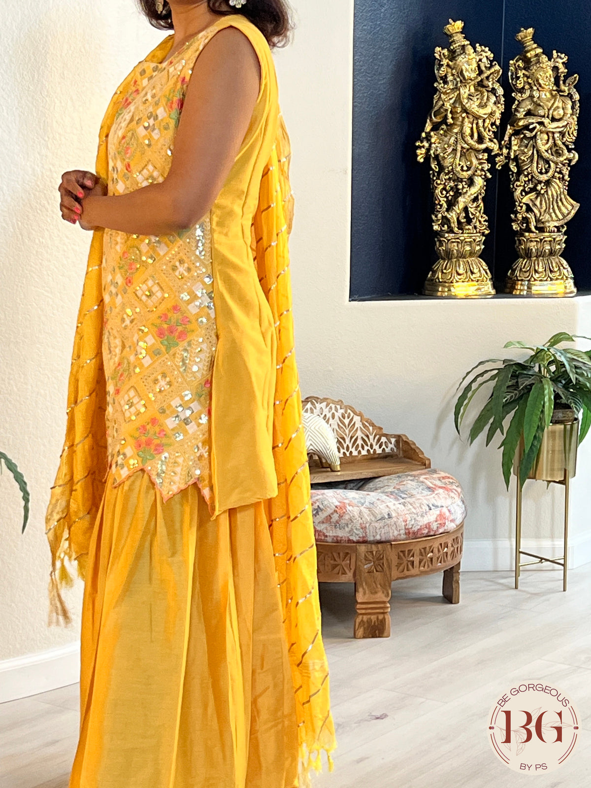 Garara set in gorgeous yellow color with gota and thread work