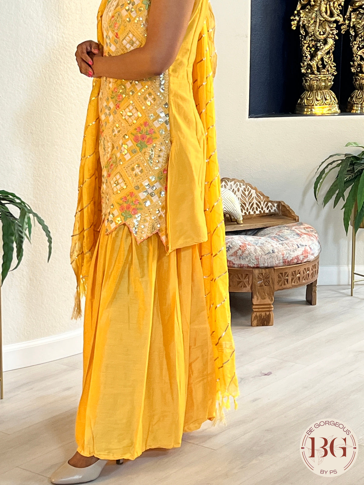 Garara set in gorgeous yellow color with gota and thread work