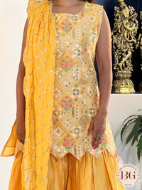 Garara set in gorgeous yellow color with gota and thread work