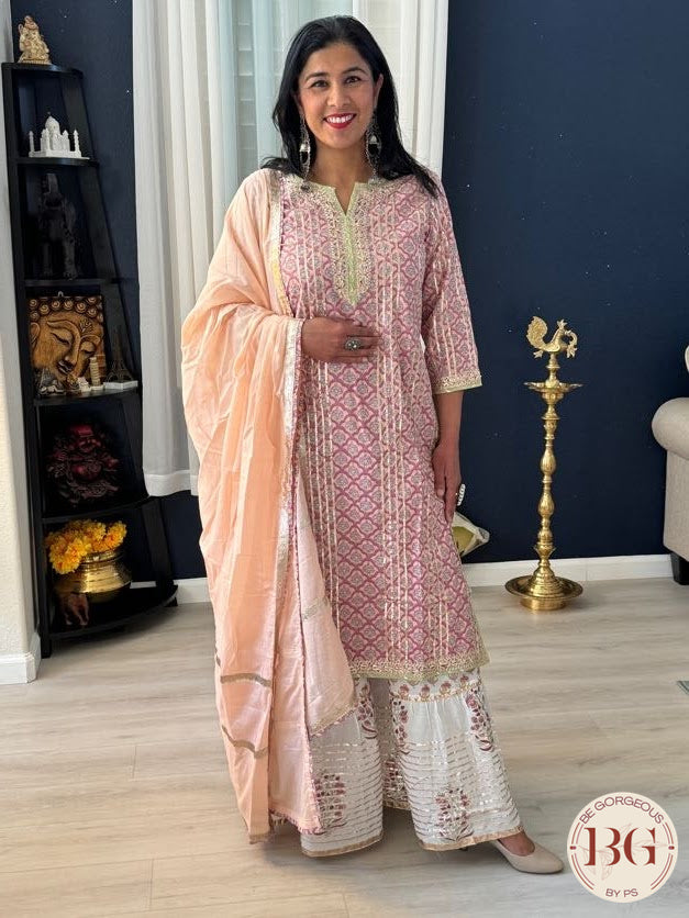 Cotton garara set in peach pink color with gota work