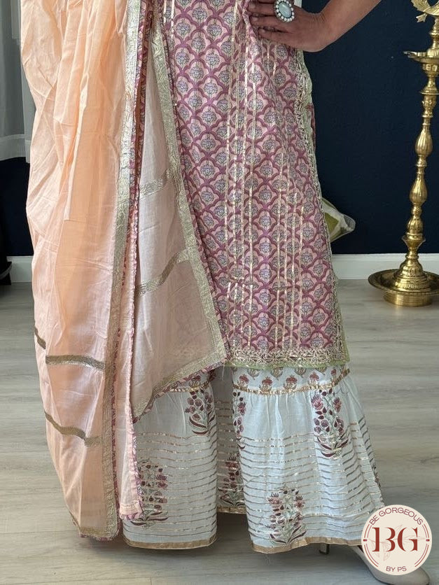 Cotton garara set in peach pink color with gota work