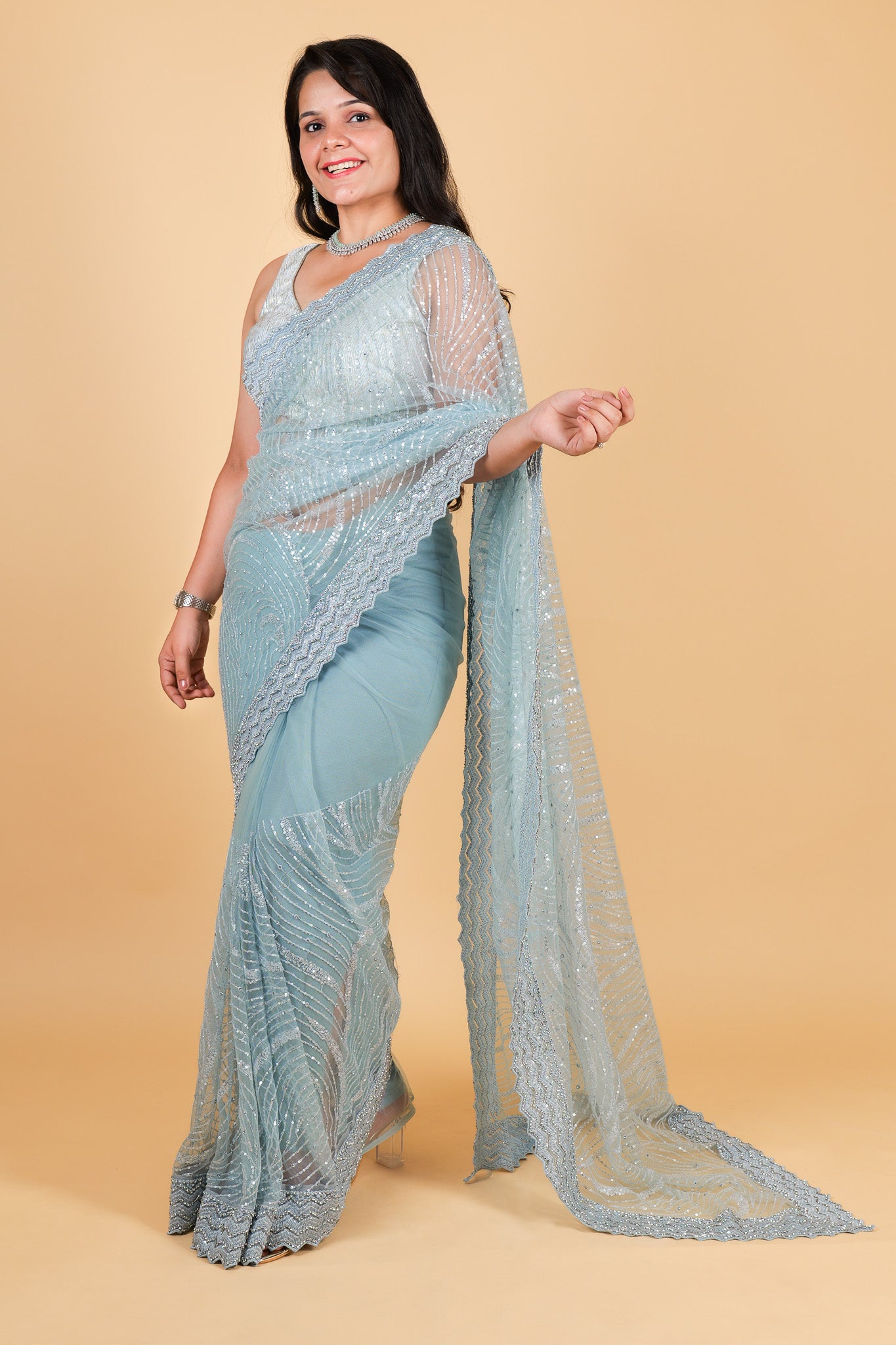 Net designer saree with thread embroidery and sequin work - blue color