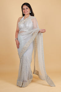 Net designer saree with thread embroidery and sequin work - bluish grey color