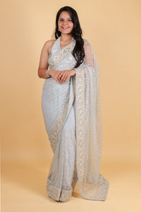 Net designer saree with thread embroidery and sequin work - bluish grey color