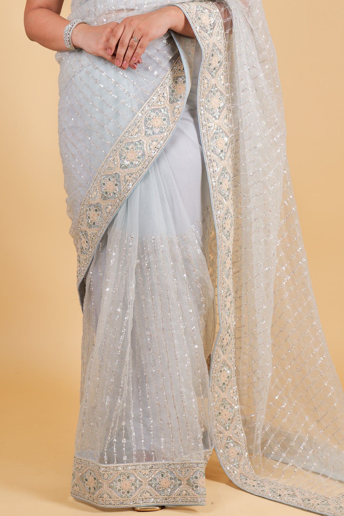 Net designer saree with thread embroidery and sequin work - bluish grey color