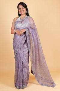 Net saree with print, swarosvki and sequin work - purple color