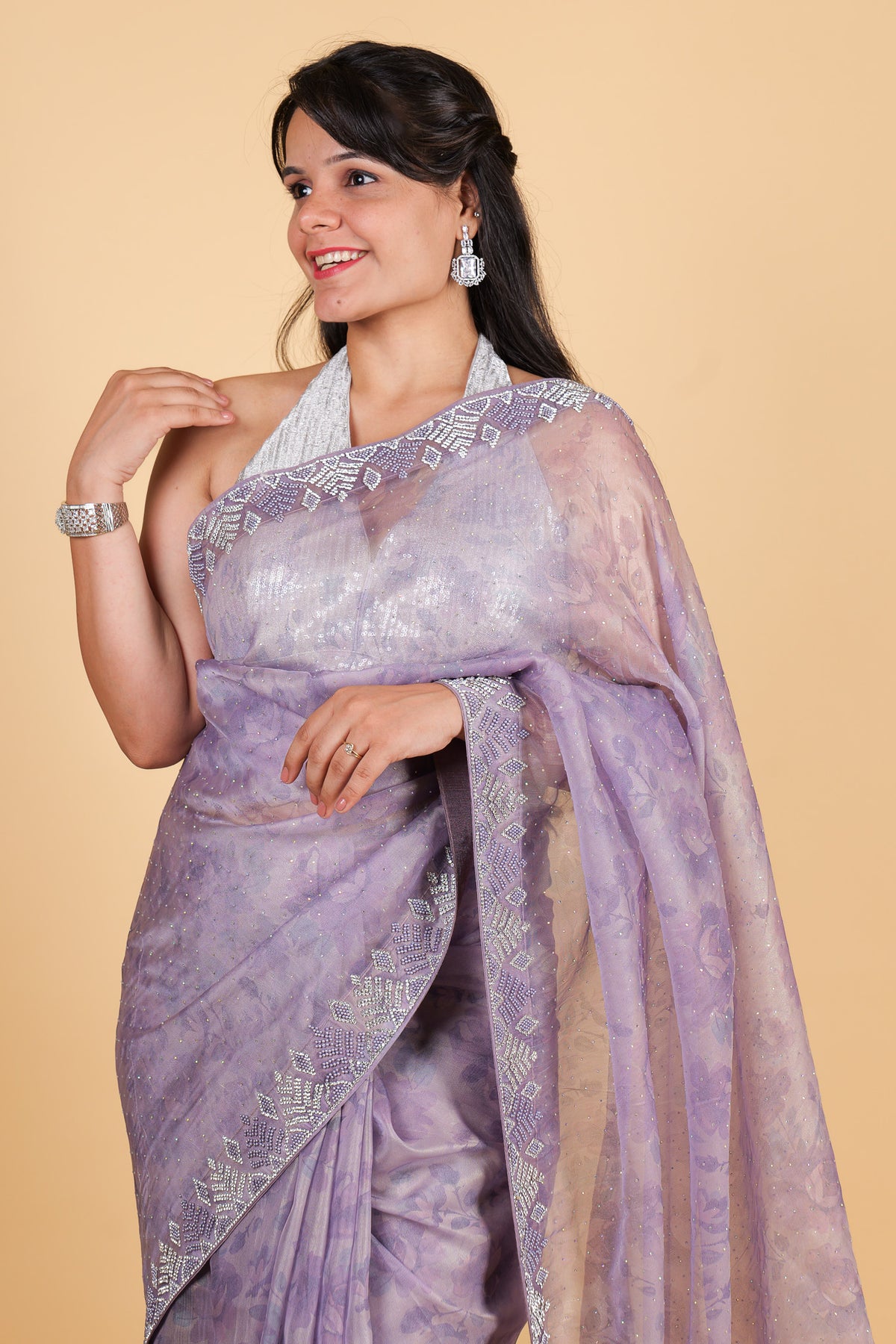 Net saree with print, swarosvki and sequin work - purple color