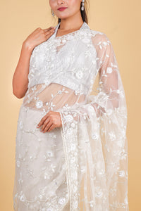 Net designer saree with thread embroidery and sequin work - cream color