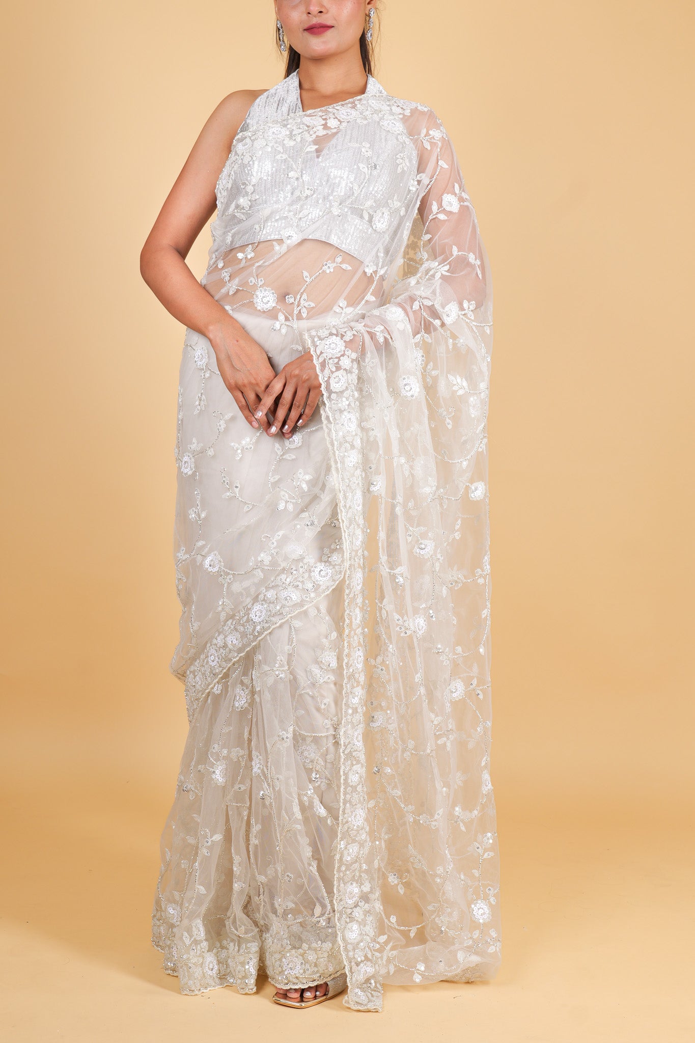 Net designer saree with thread embroidery and sequin work - cream color