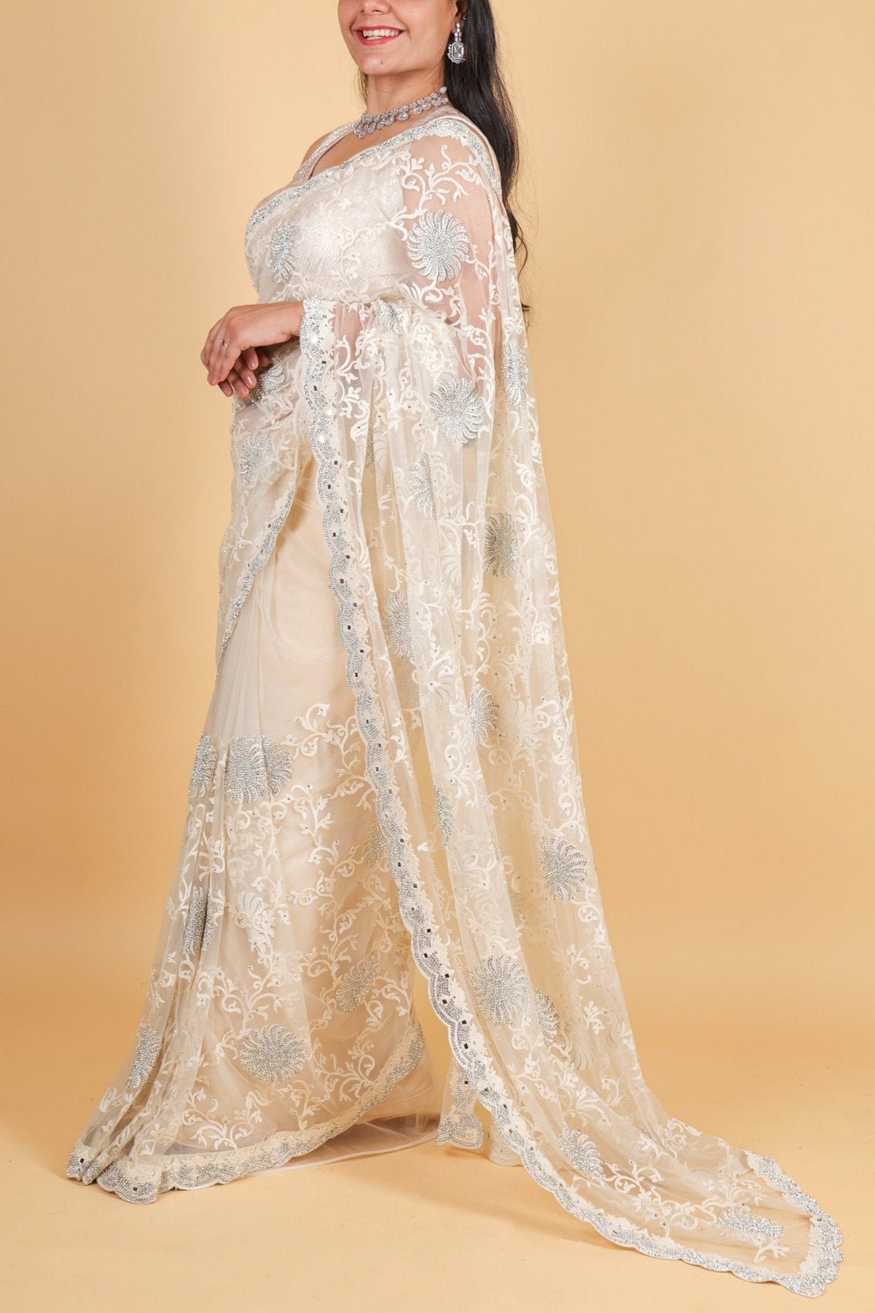 Designer Net saree with swarosvki, mirror detailing and thread work - Cream