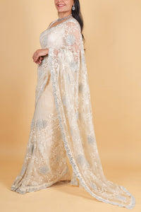 Designer Net saree with swarosvki, mirror detailing and thread work - Cream