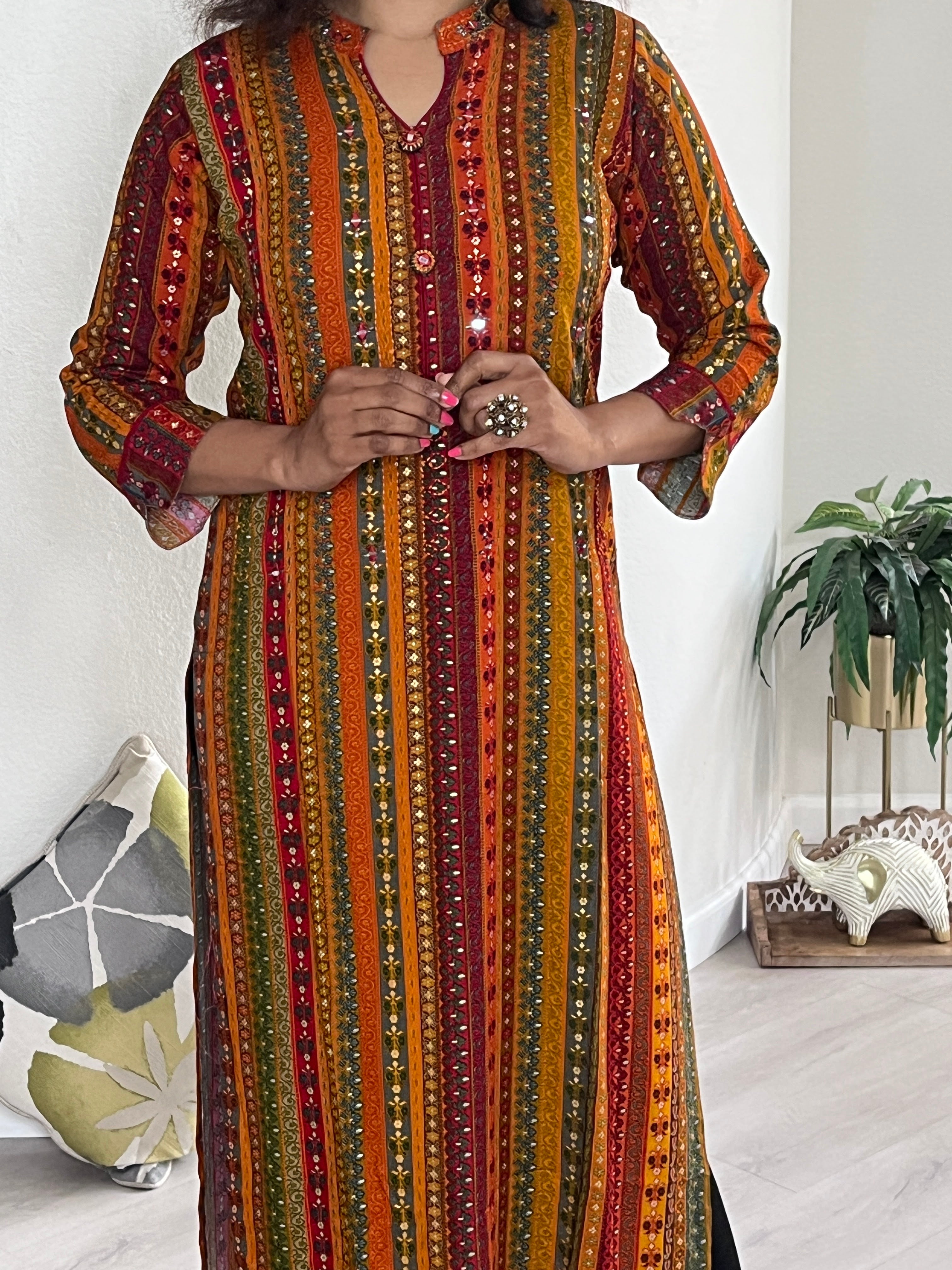 Straight cut Reyon multicolor Kurti with print and embroidery.