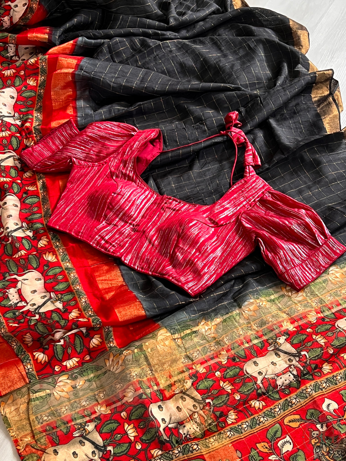 Soft linen silk saree with zari weaving checks & contrast pichwai digital printed border saree color - black